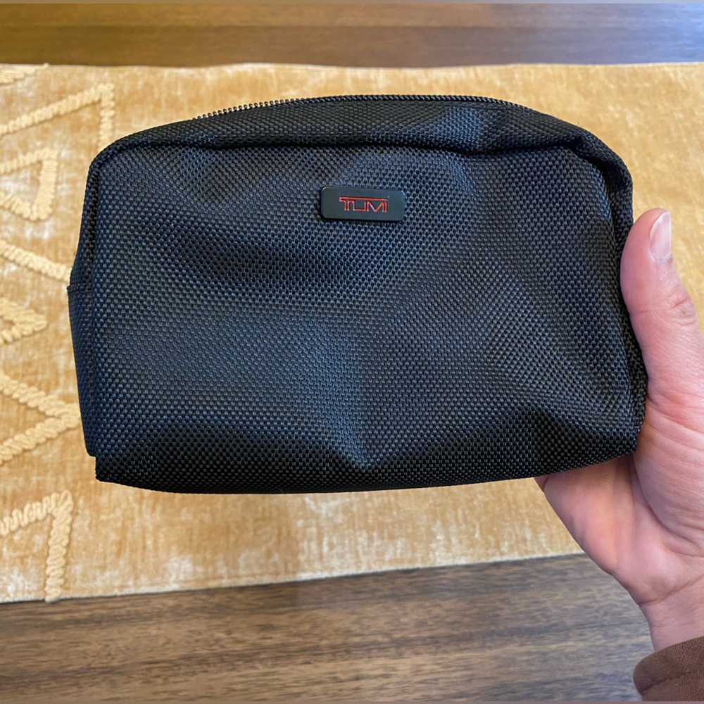 Tiny Tumi Travel Pouch
